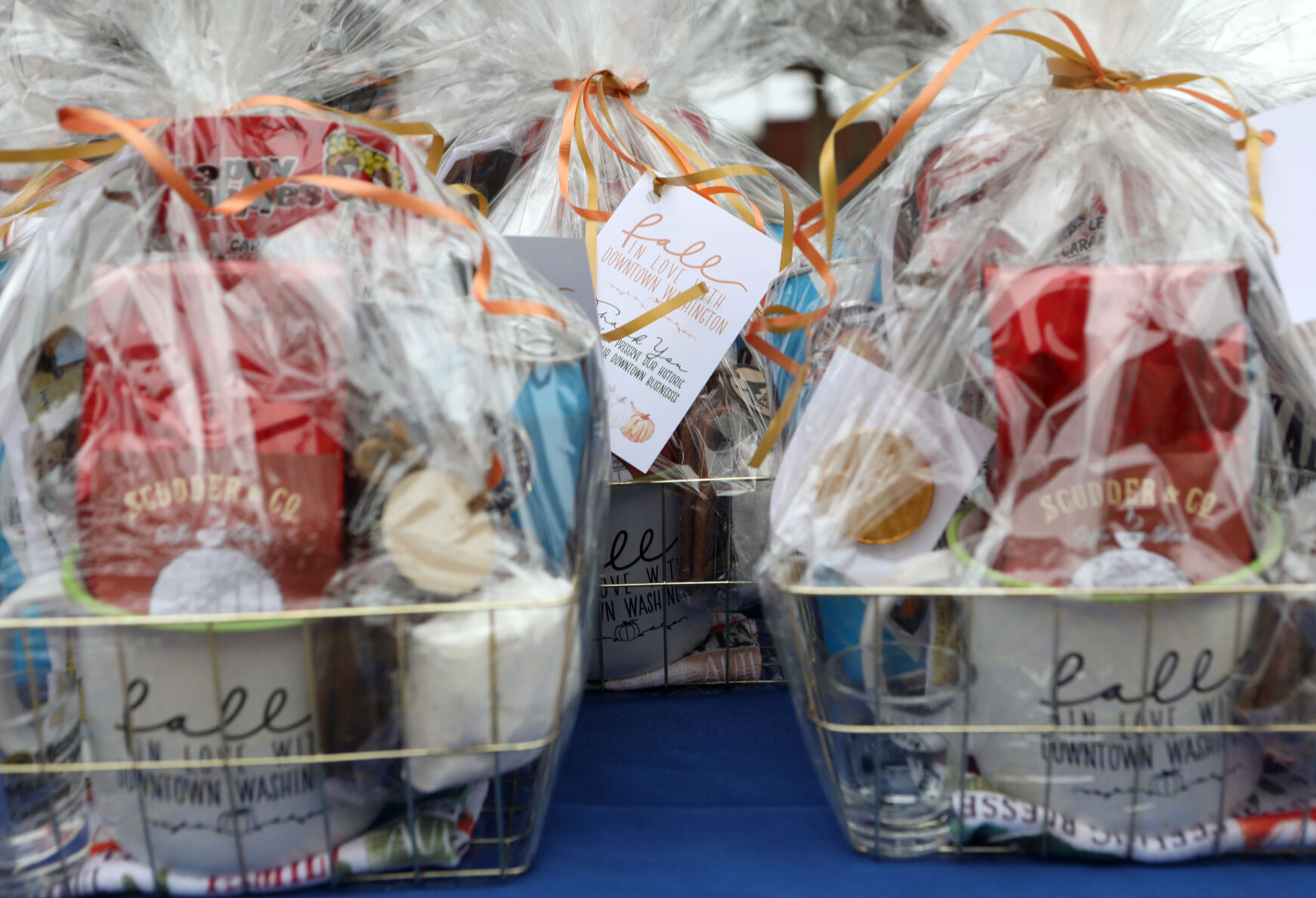 Fall themed gift Baskets sit on a table
